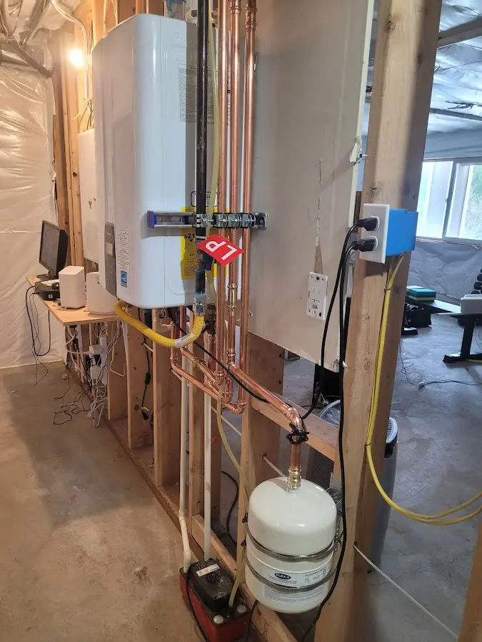 Licensed plumber repairing a kitchen sink in Elko